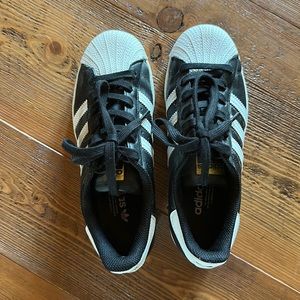 Woman’s Black and white Adidas - size 5